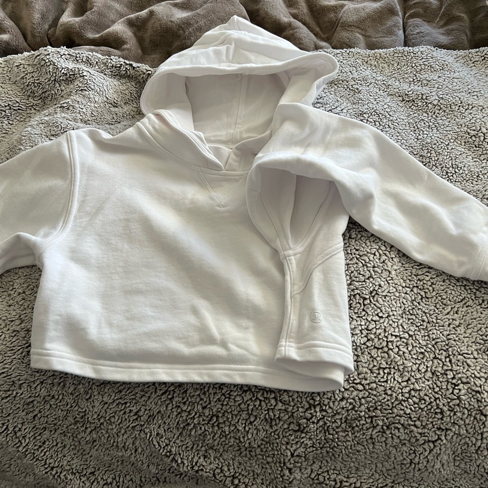Lululemon white, long sleeve cropped hoodie. Size 0